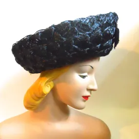 Black Glossy Wide Weave Sisal Hat with Upturned Brim and Tassel circa 1960s